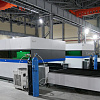 FL-L1560FHE-10000-Raycus Лазерный станок для резки листового металла с кабинетной защитой и сменным столом